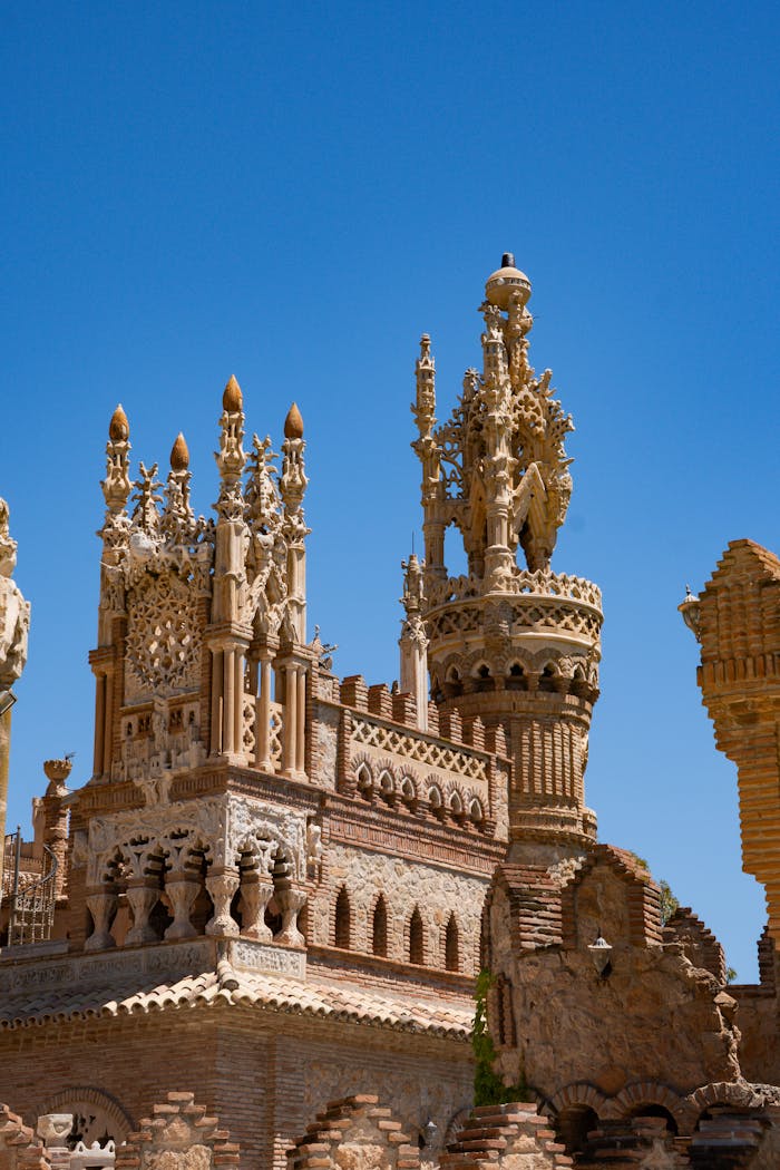Stunning view of Castillo de Colomares under clear blue skies in Benalmádena, Spain.